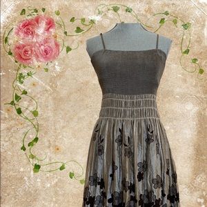 Form fitting upper bodice dress.